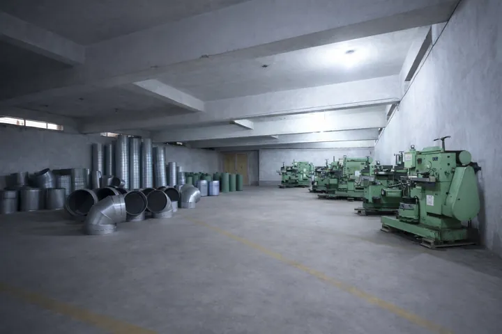 Rows of lathes and shaping machines in the machine shop