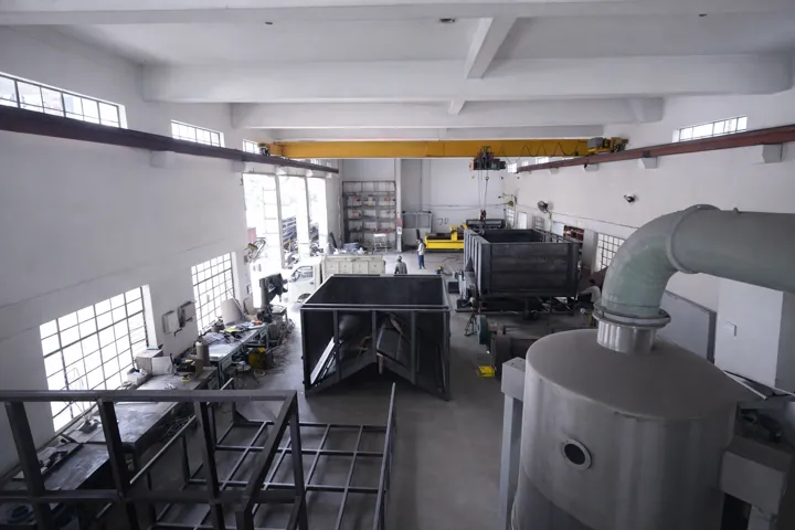 Fabricated hoppers and a process vessel under assembly
