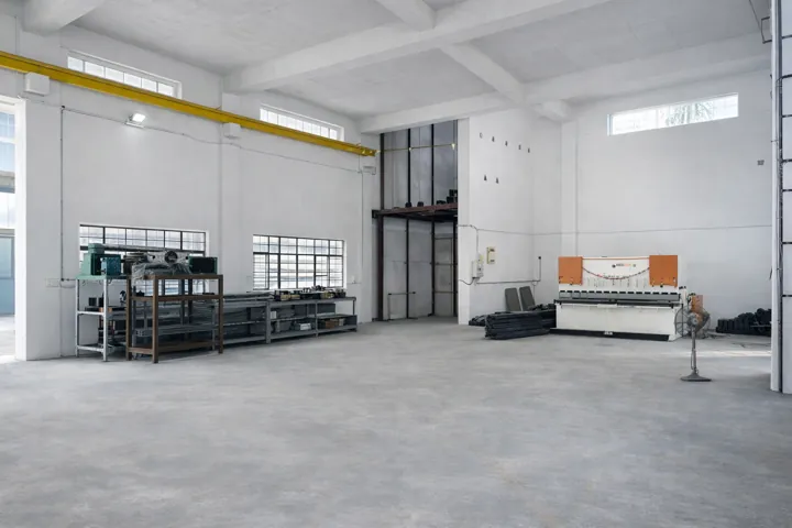 An open bay of the works with sheet-metal machinery
